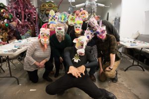 Jackrabbit team wearing the masks they created 